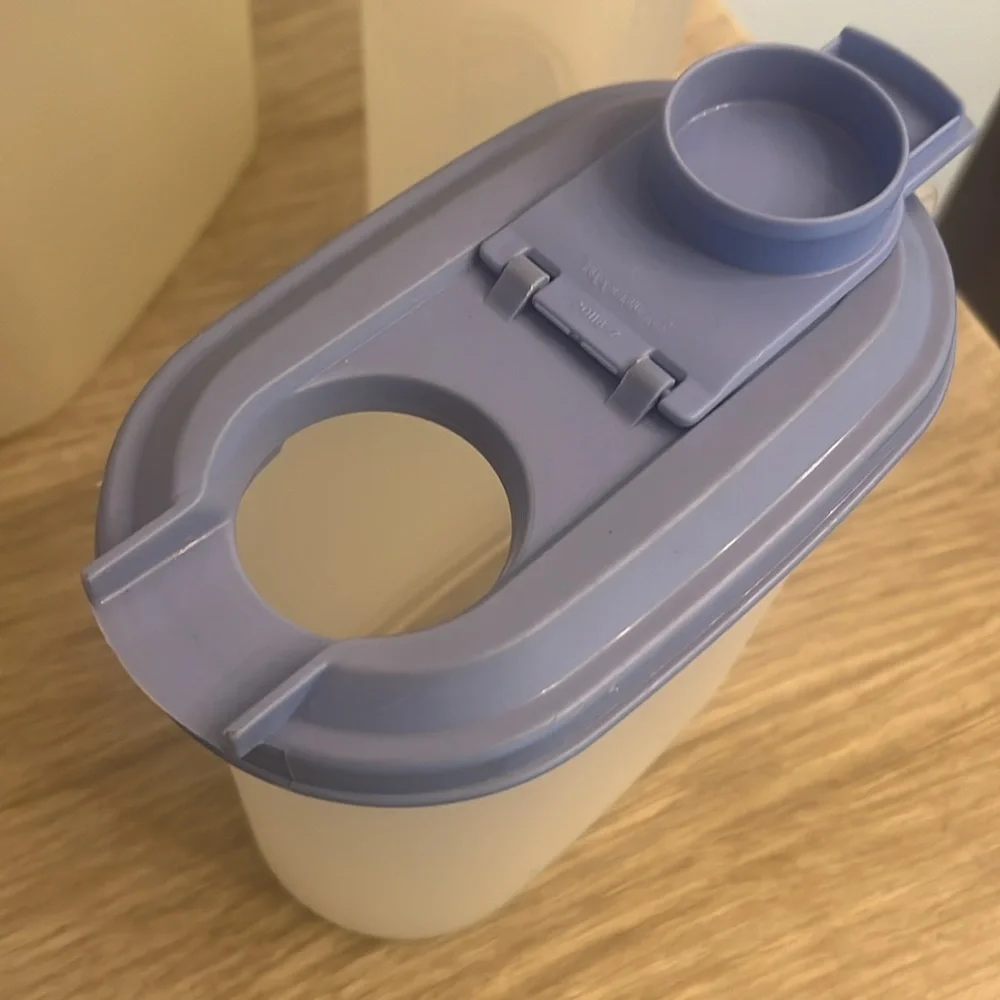 Set of three containers. Drink pitcher, storage and one for cereal, grai…